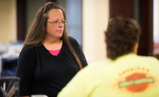 MOREHEAD, KY - SEPTEMBER 2:  Kim Davis, the Rowan County Clerk of Courts, speaks to coworkers at the County Clerks Office on September 2, 2015 in Morehead, Kentucky. Citing a sincere religious objection, Davis, an Apostolic Christian, has refused to issue marriage licenses to same-sex couples in defiance of a Supreme Court ruling. (Photo by Ty Wright/Getty Images)